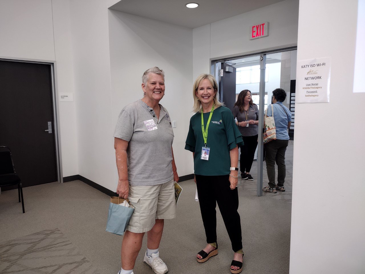 Ida Franklin of Venus Construction, a longtime Katy ISD Partner in Education partner, visits with Janet Theiss, executive director of the Katy ISD Partners in Education program, at the Business and Community Partnerships Open House.